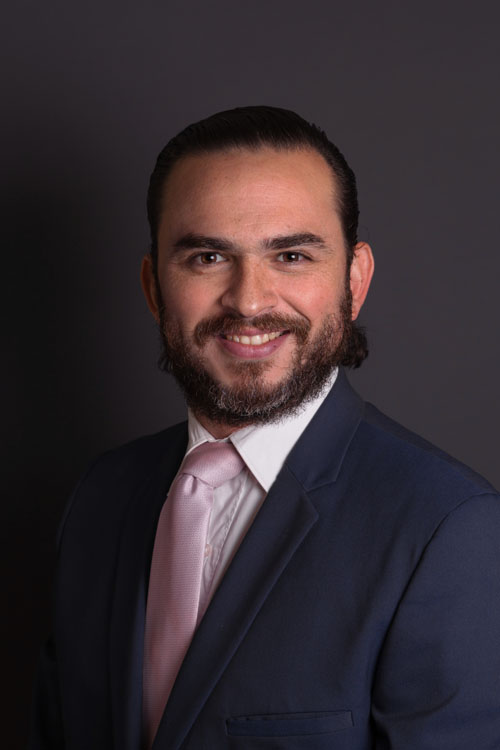 Dr. Carlos Andres Garza Lizano